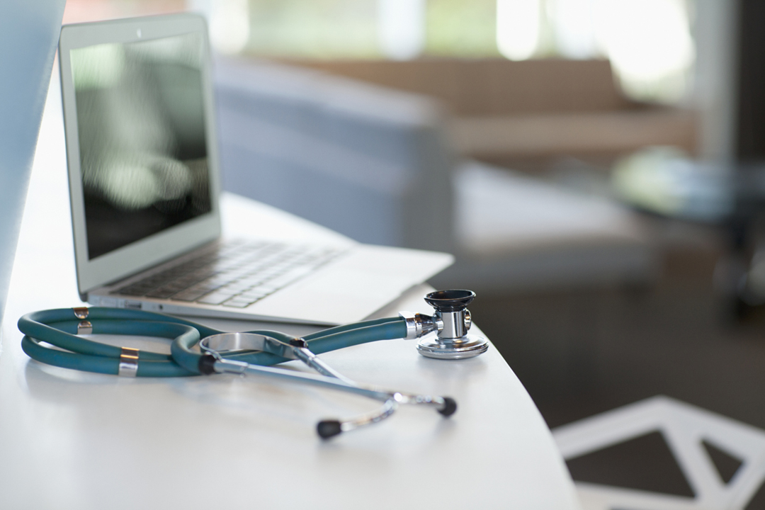 Stethoscope and laptop