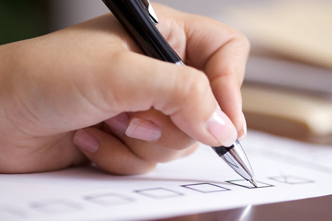 Hand with tick list