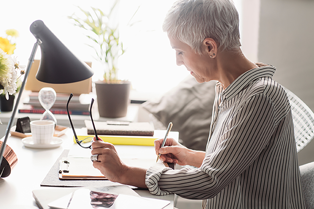 Business woman writing