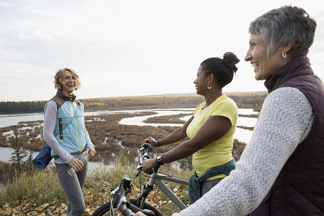 Three ladies cycling