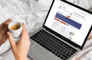 Person using contributions calculator on laptop